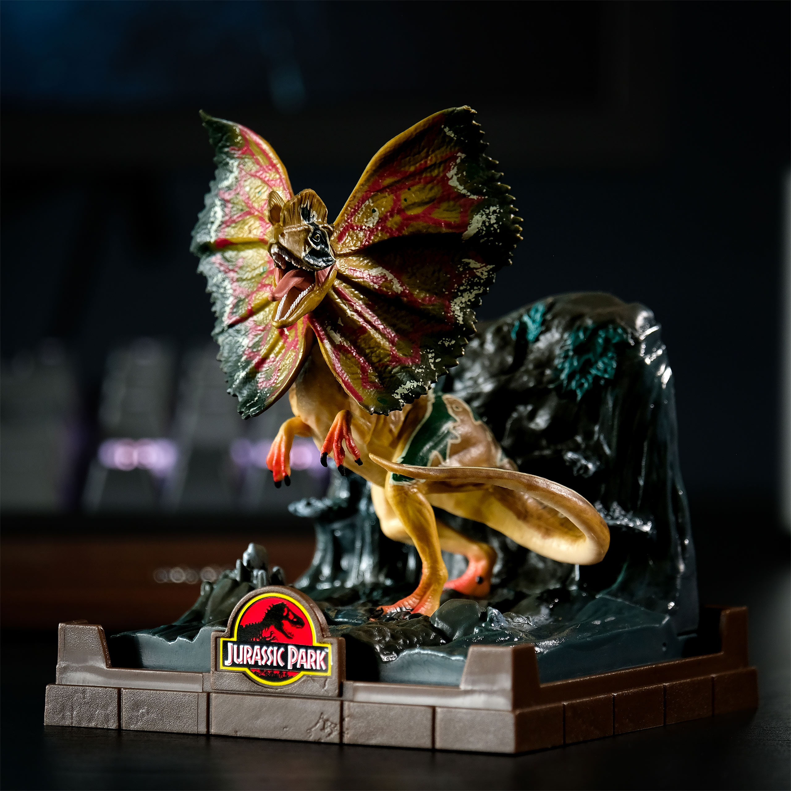 Jurassic Park - Figura de Dilophosaurus - The Noble Collection